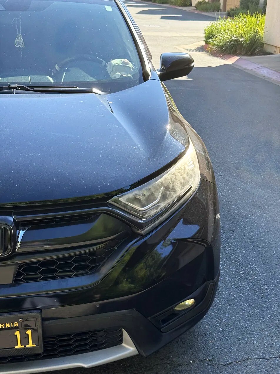 Foggy oxidized Honda CRV headlight before restoration